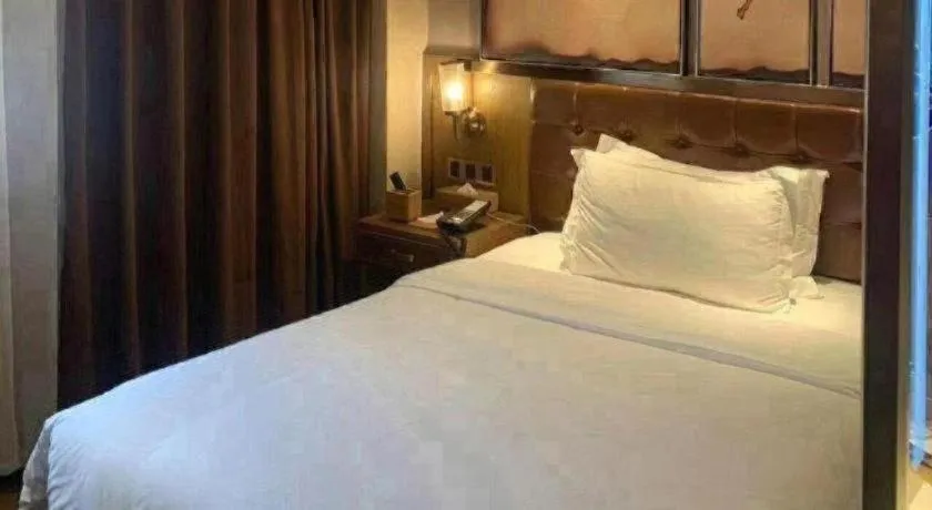 Bed in James Joyce Coffetel Tianjin Railway Station