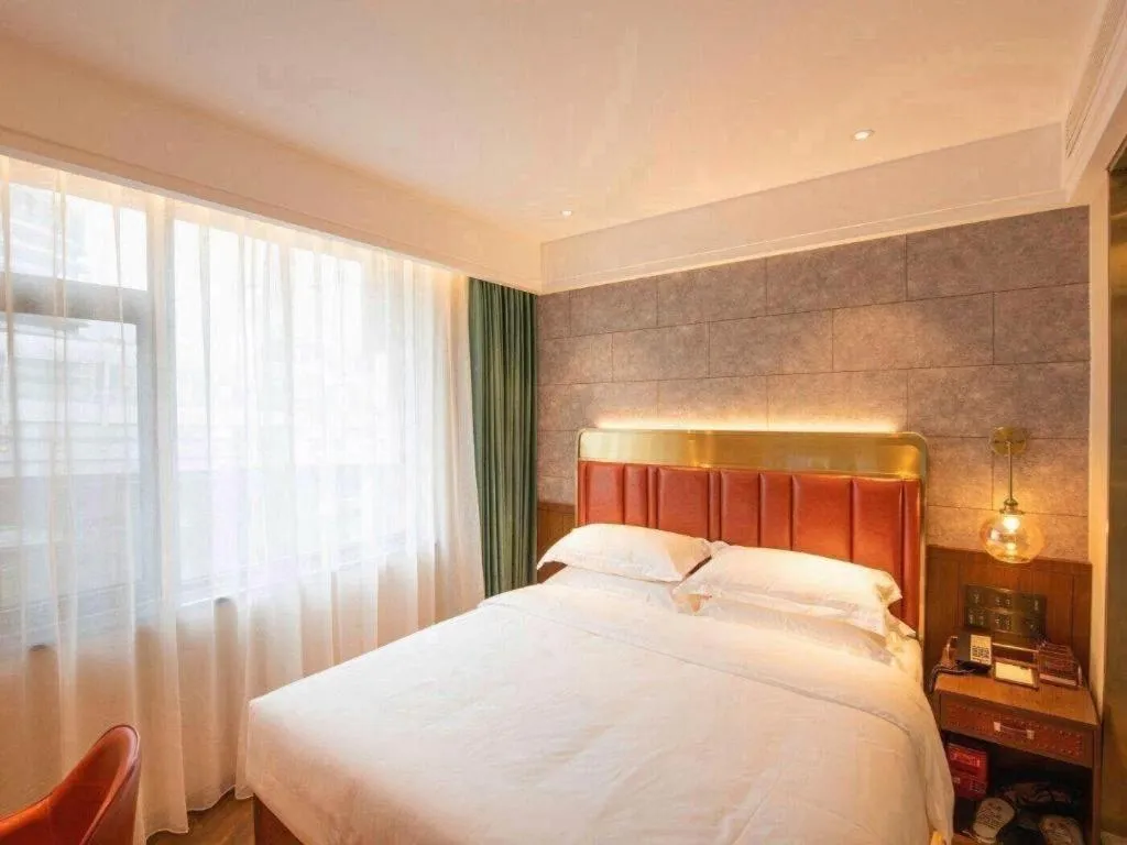 Bed in James Joyce Coffetel Tianjin Railway Station