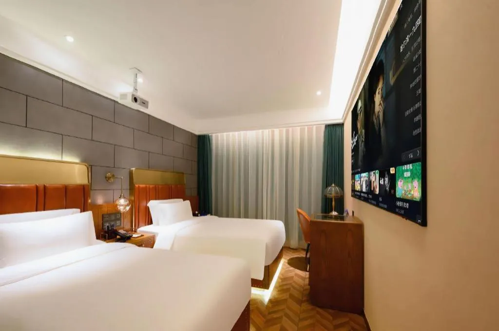 Bed in James Joyce Coffetel Tianjin Railway Station