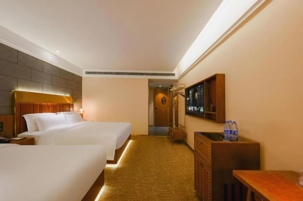 Bed in James Joyce Coffetel Tianjin Railway Station