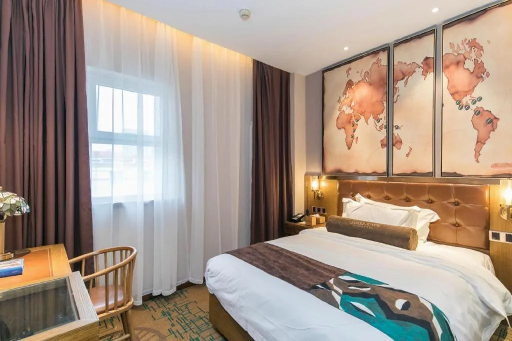 Bed in James Joyce Coffetel Tianjin Railway Station