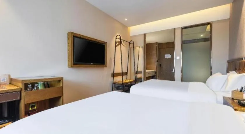 Bed in James Joyce Coffetel Tianjin Railway Station