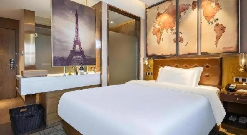 Bed in James Joyce Coffetel Tianjin Railway Station