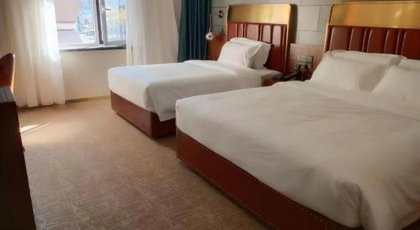 Bed in James Joyce Coffetel Tianjin Railway Station