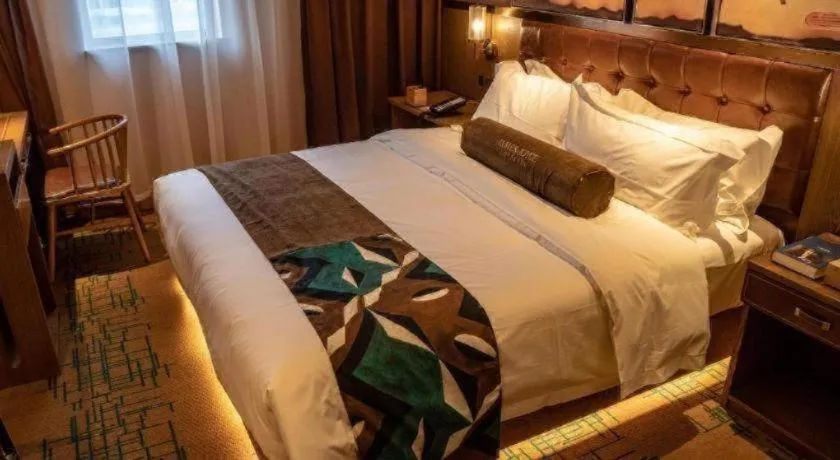 Bed in James Joyce Coffetel Tianjin Railway Station