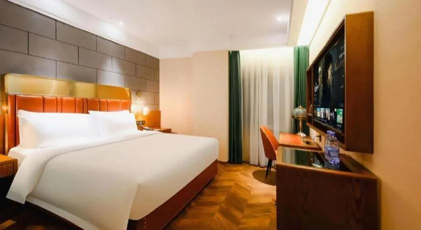 Bed in James Joyce Coffetel Tianjin Railway Station