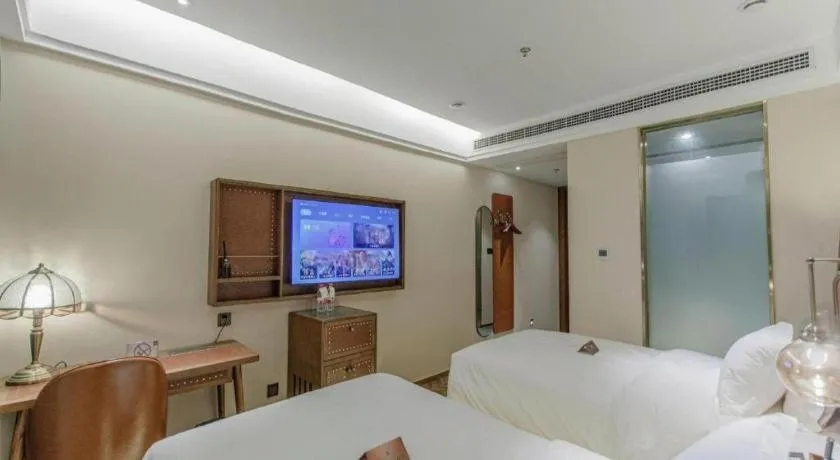 Bed in James Joyce Coffetel Tianjin Railway Station