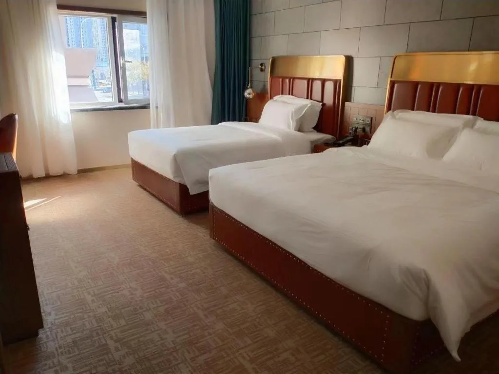 Bed in James Joyce Coffetel Tianjin Railway Station