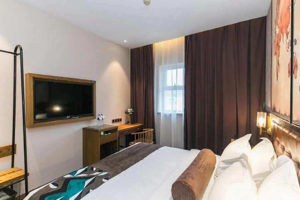 Bed in James Joyce Coffetel Tianjin Railway Station