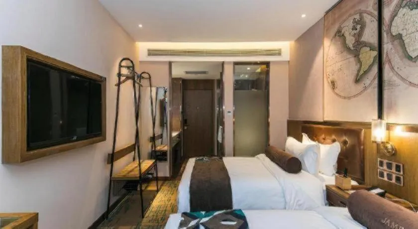 Bed in James Joyce Coffetel Tianjin Railway Station