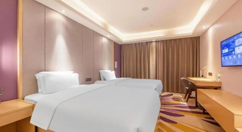 Bed in Lavande Hotels Jinzhong Youjian Pingyao