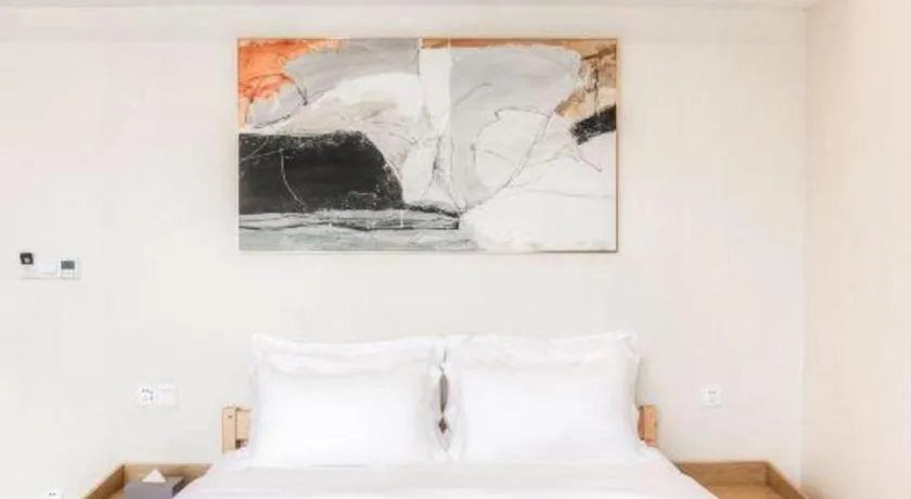 Bed in ZMAX Hotels Wuhan East Lake