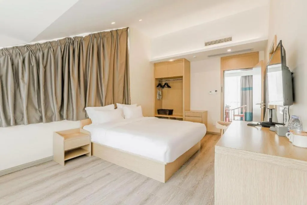 Bed in ZMAX Hotels Wuhan East Lake