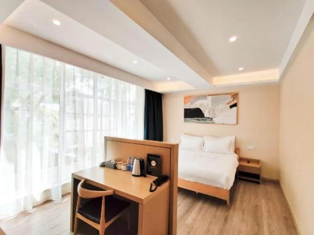 Bed in ZMAX Hotels Wuhan East Lake