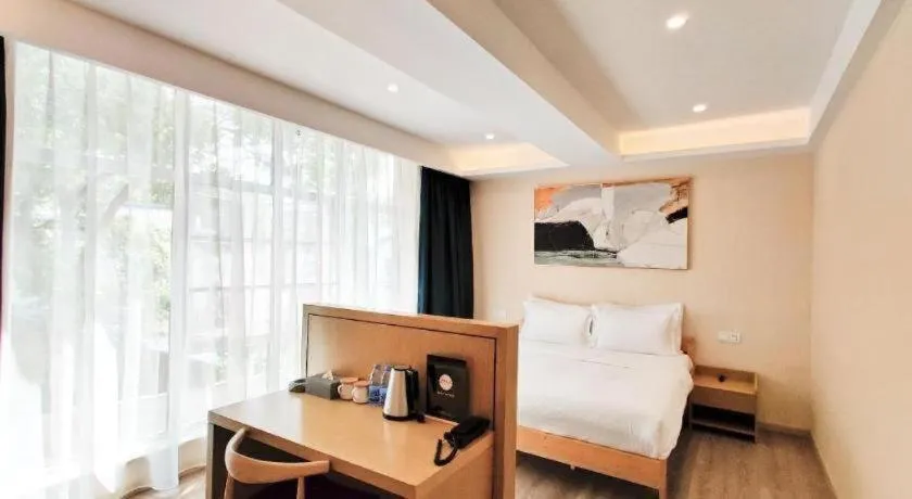 Bed in ZMAX Hotels Wuhan East Lake