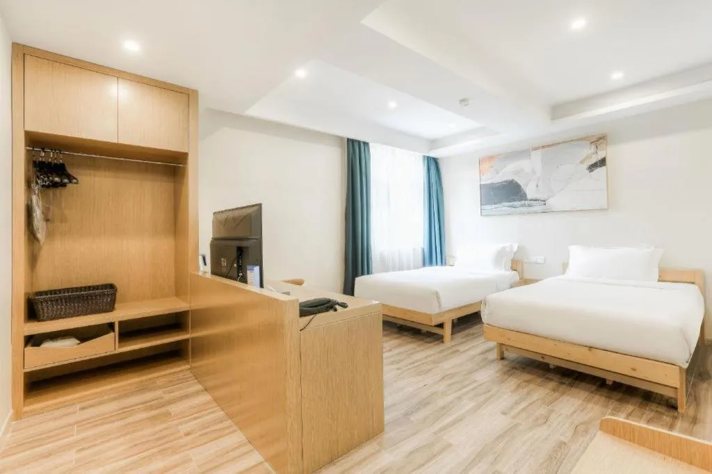 Bed in ZMAX Hotels Wuhan East Lake