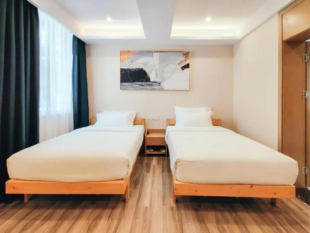 Bed in ZMAX Hotels Wuhan East Lake