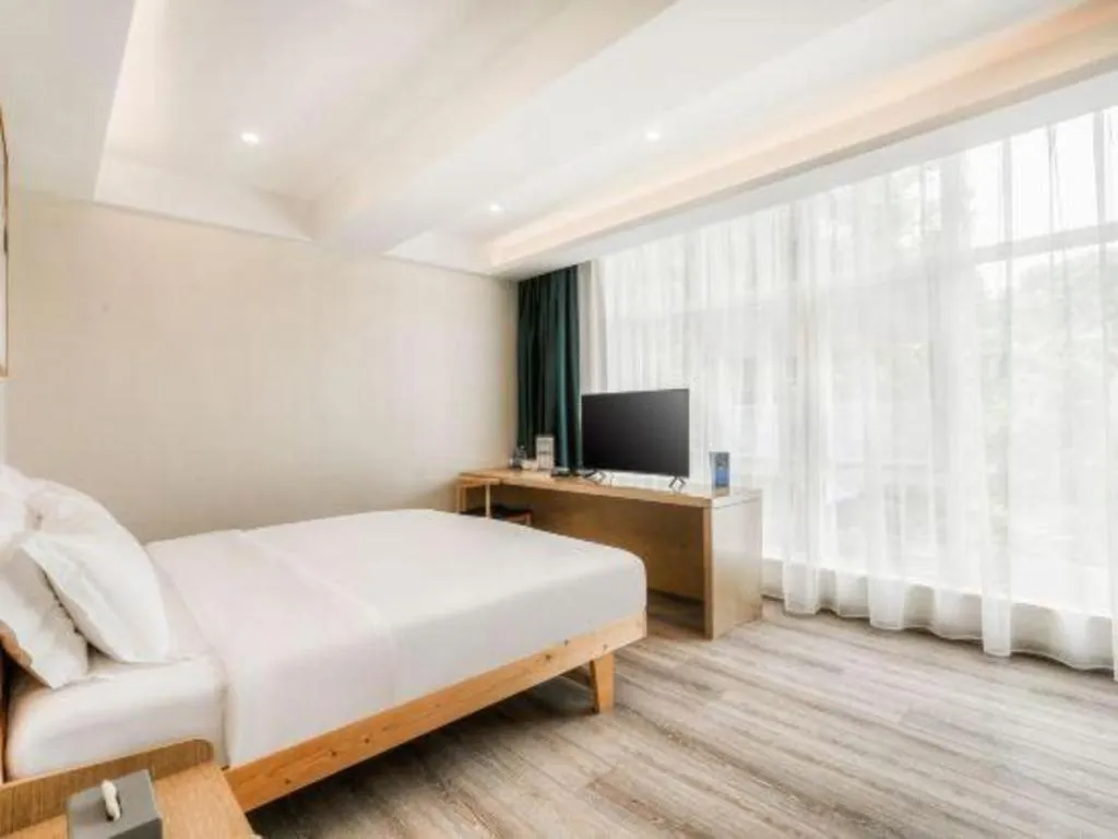 Bed in ZMAX Hotels Wuhan East Lake