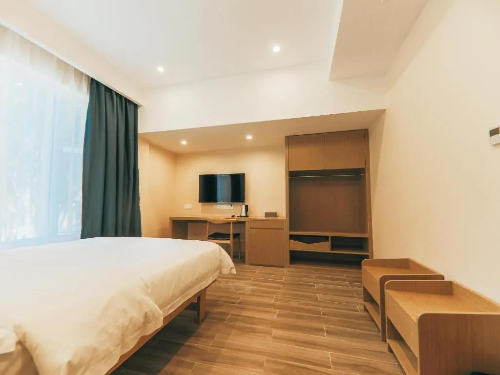 Bed in ZMAX Hotels Wuhan East Lake