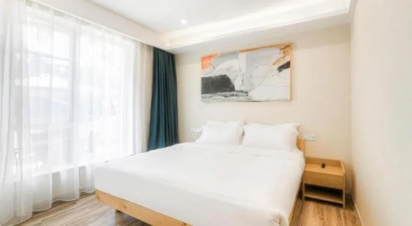 Bed in ZMAX Hotels Wuhan East Lake