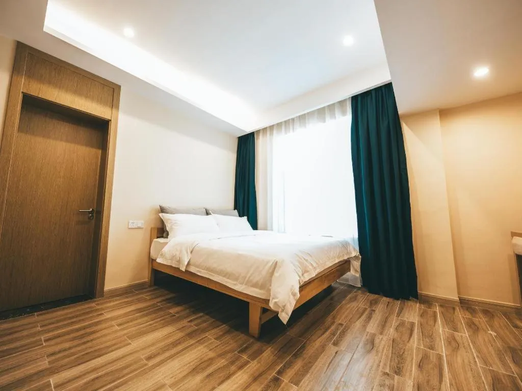 Bed in ZMAX Hotels Wuhan East Lake