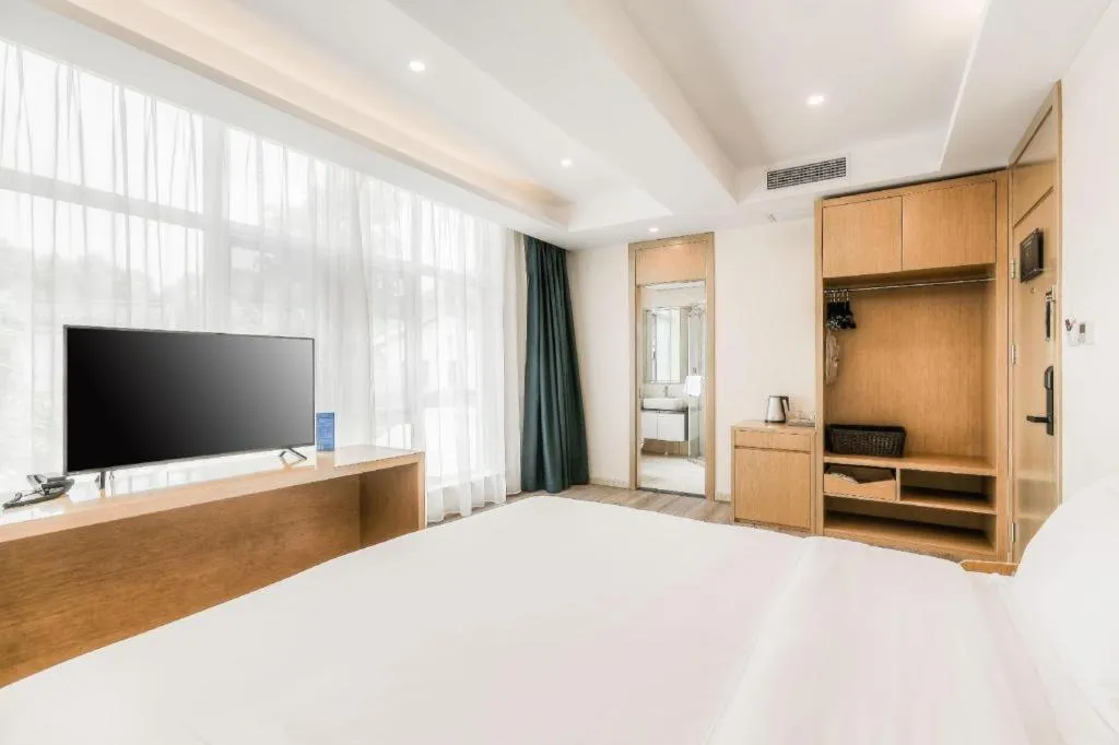 Bed in ZMAX Hotels Wuhan East Lake