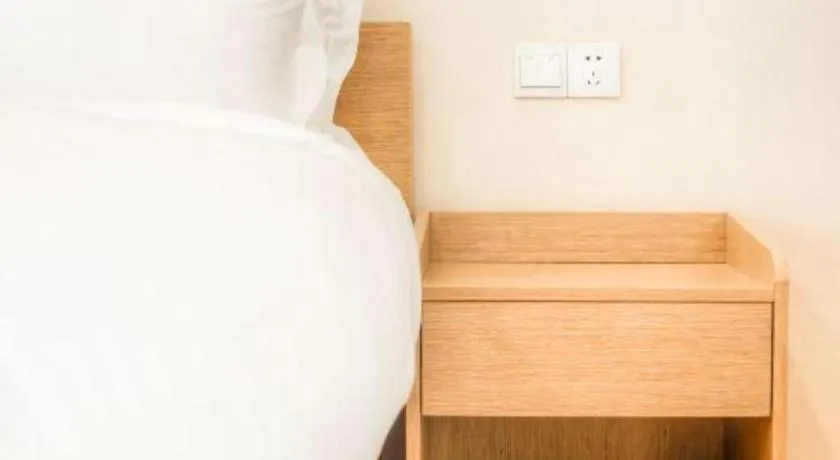 Bed in ZMAX Hotels Wuhan East Lake