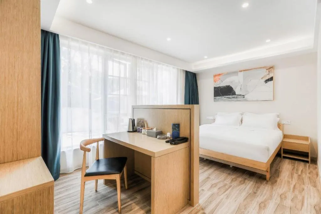 Bed in ZMAX Hotels Wuhan East Lake