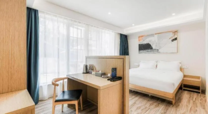 Bed in ZMAX Hotels Wuhan East Lake