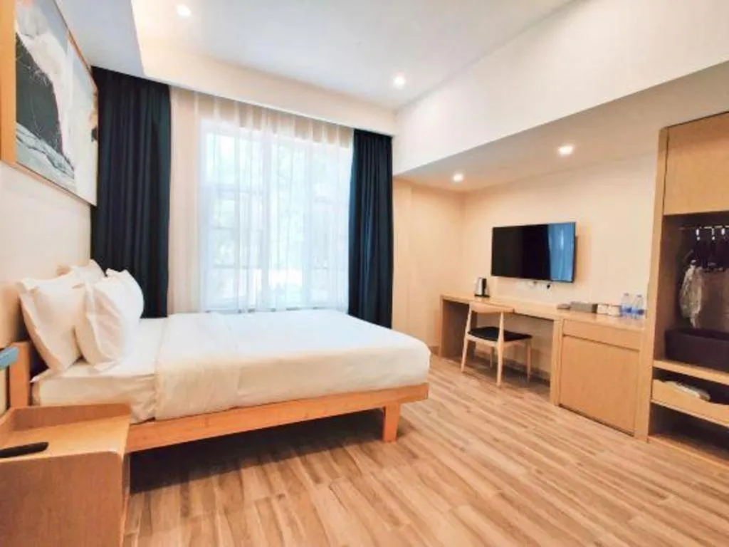 Bed in ZMAX Hotels Wuhan East Lake