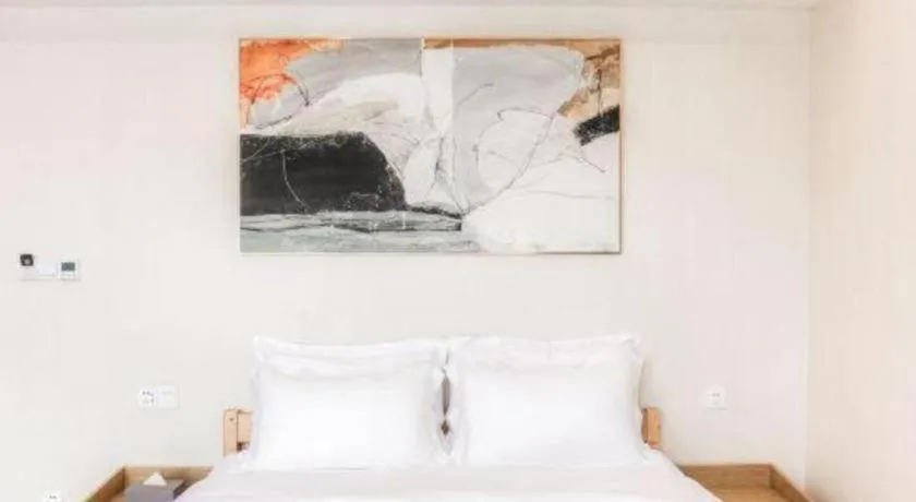 Bed in ZMAX Hotels Wuhan East Lake