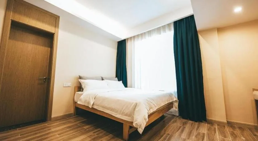 Bed in ZMAX Hotels Wuhan East Lake