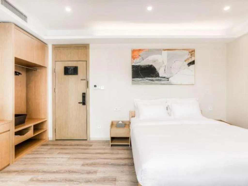 Bed in ZMAX Hotels Wuhan East Lake