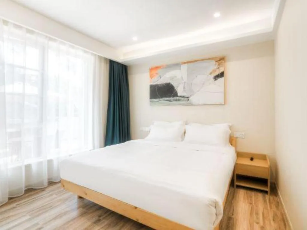 Bed in ZMAX Hotels Wuhan East Lake