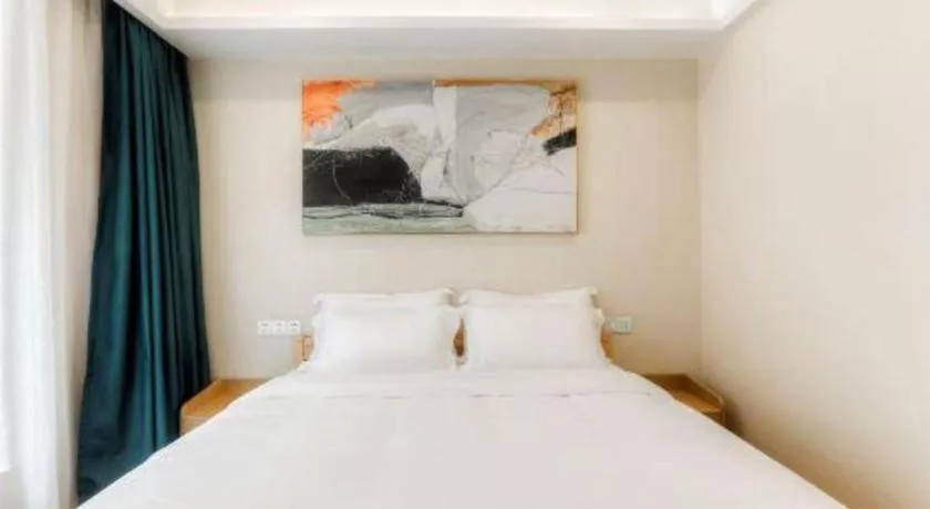 Bed in ZMAX Hotels Wuhan East Lake