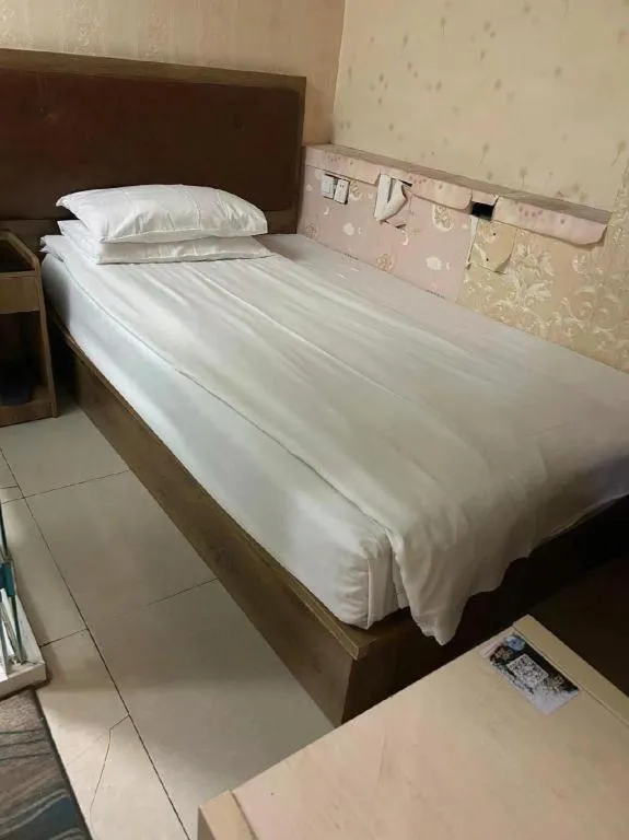 Bed in PAI Hotels Beijing Tongzhou Majuqiao