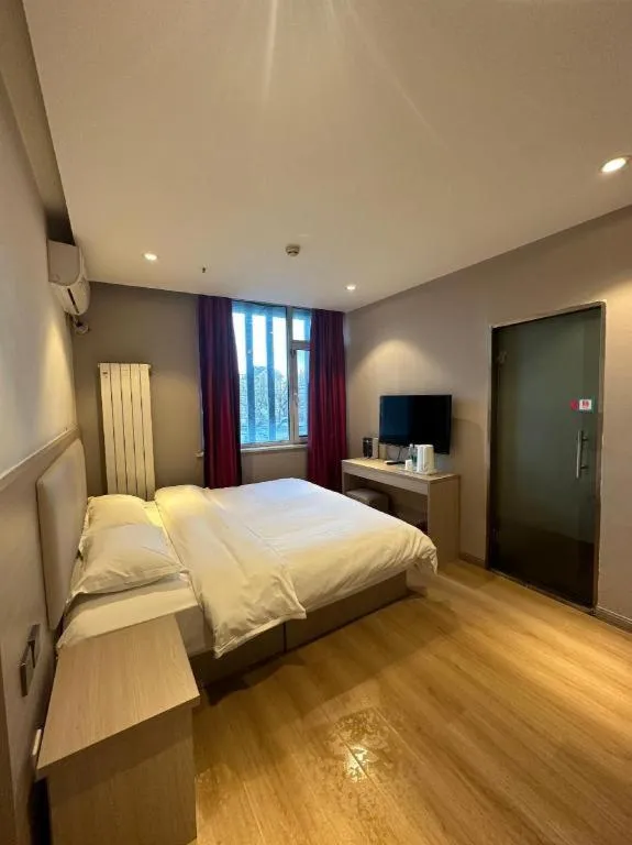 Bed in PAI Hotels Beijing Tongzhou Majuqiao