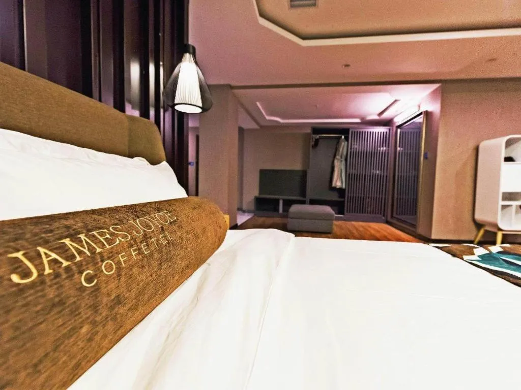 Bed in James Joyce Coffetel Jilin Railway Station Fortune Plaza