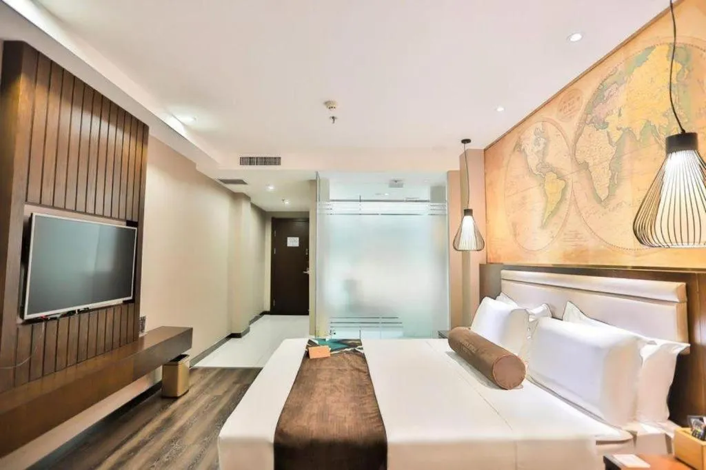 Bed in James Joyce Coffetel Jilin Railway Station Fortune Plaza