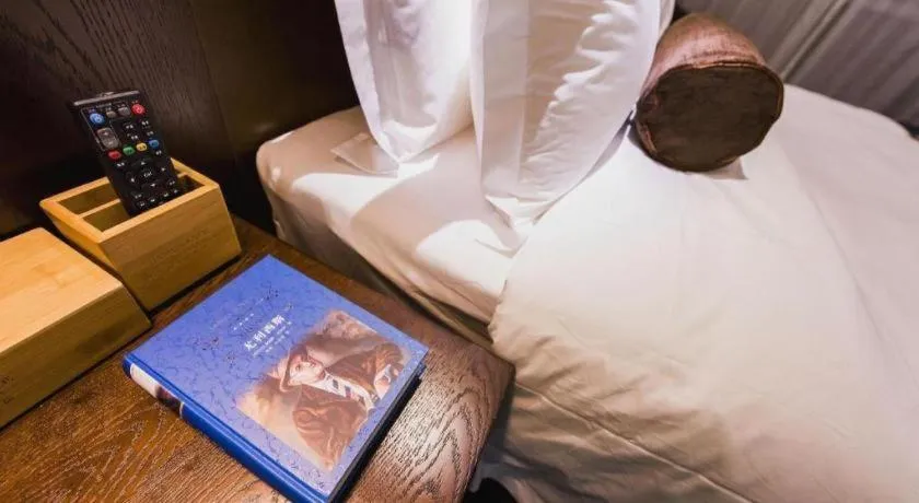 Bed in James Joyce Coffetel Jilin Railway Station Fortune Plaza