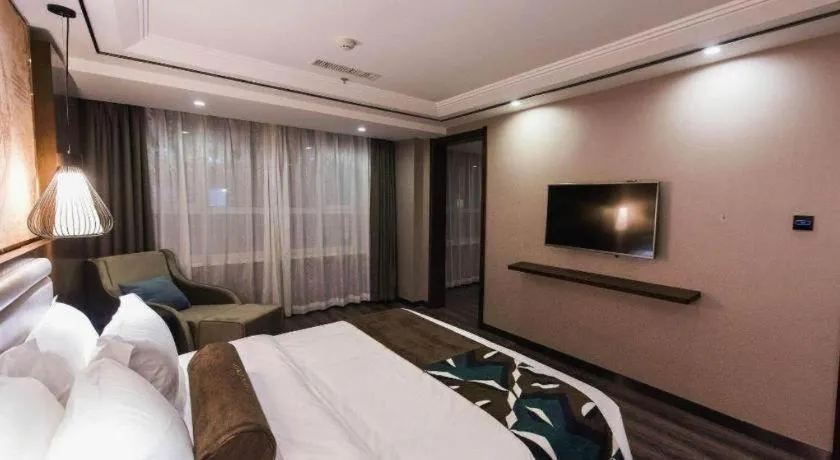 Bed in James Joyce Coffetel Jilin Railway Station Fortune Plaza