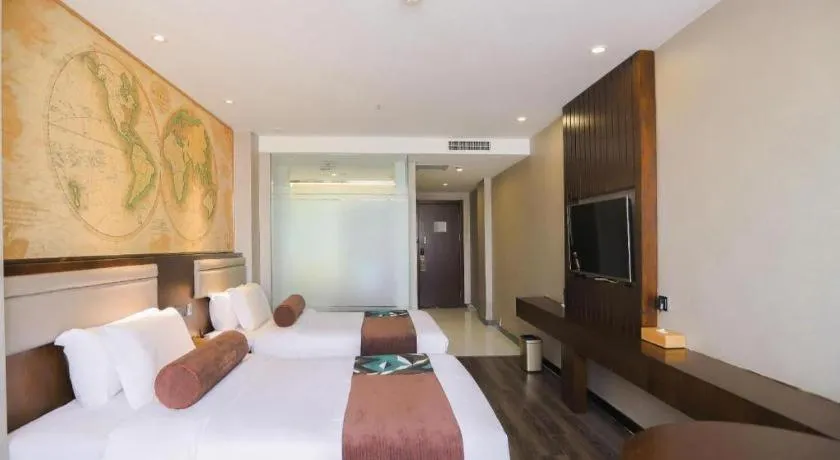 Bed in James Joyce Coffetel Jilin Railway Station Fortune Plaza