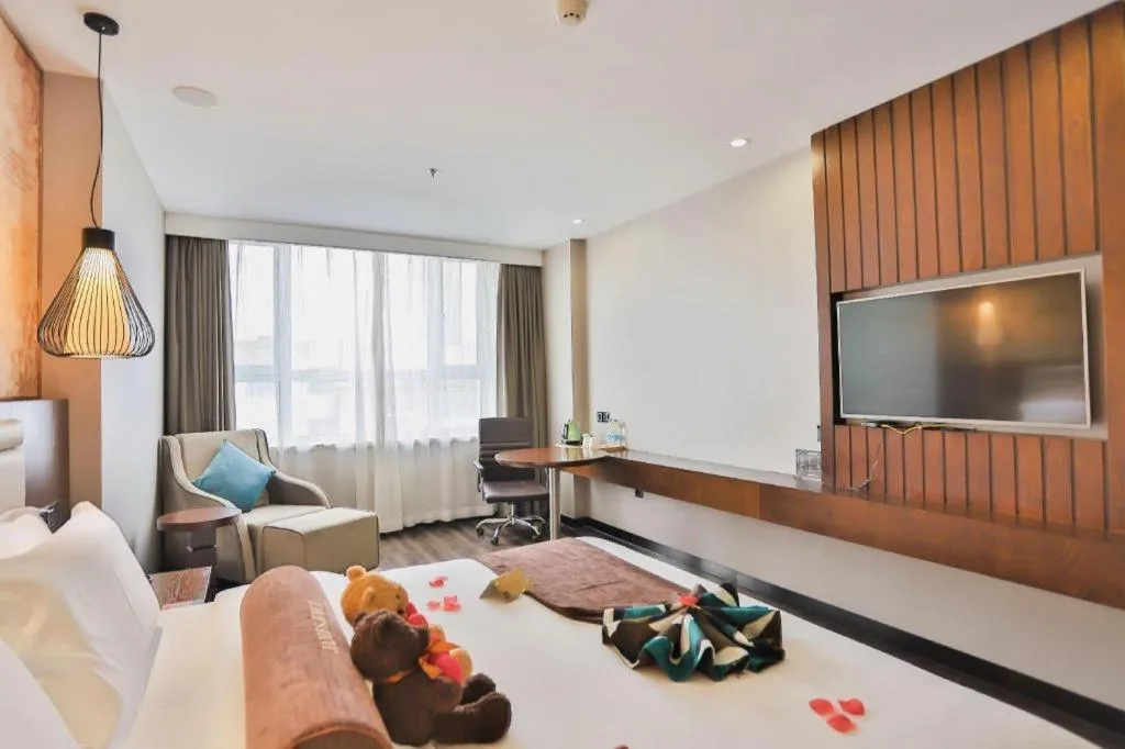 Bed in James Joyce Coffetel Jilin Railway Station Fortune Plaza