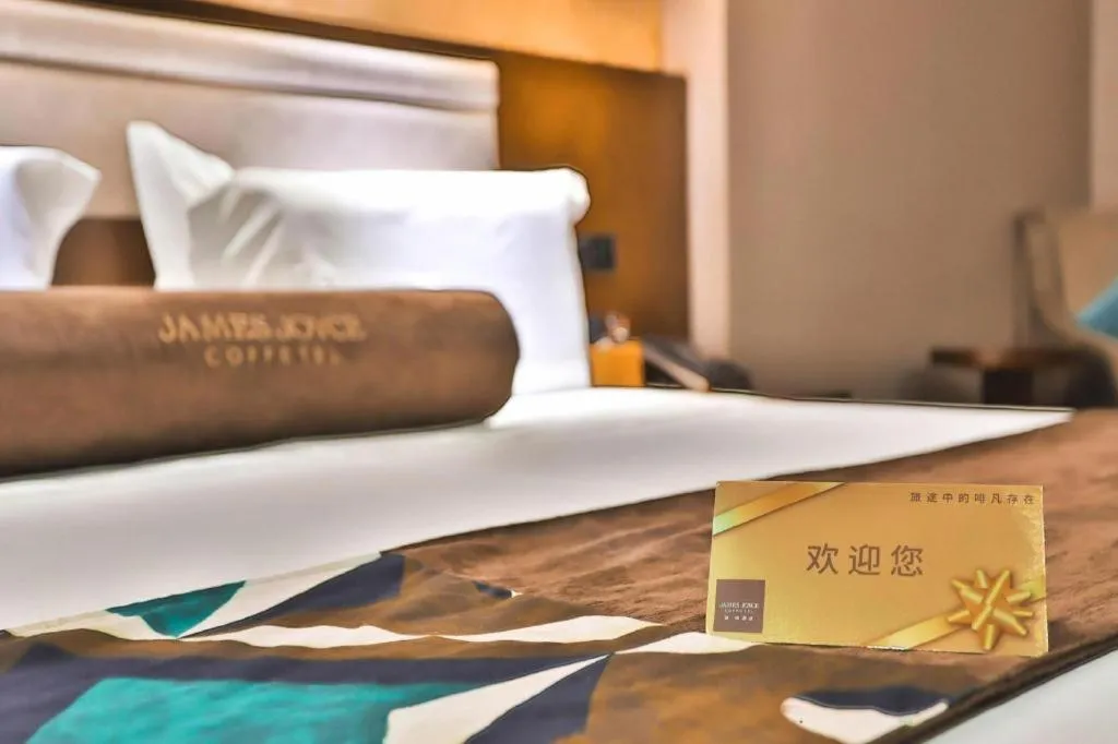 Bed in James Joyce Coffetel Jilin Railway Station Fortune Plaza