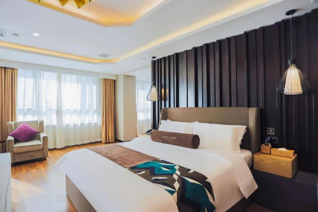 Bed in James Joyce Coffetel Jilin Railway Station Fortune Plaza