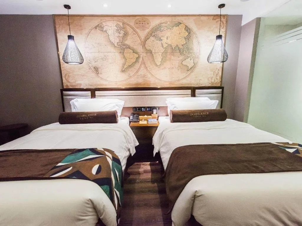 Bed in James Joyce Coffetel Jilin Railway Station Fortune Plaza