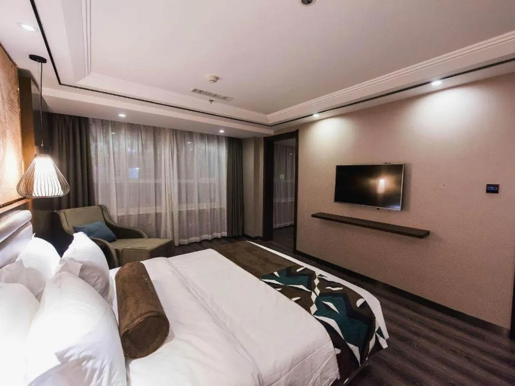 Bed in James Joyce Coffetel Jilin Railway Station Fortune Plaza