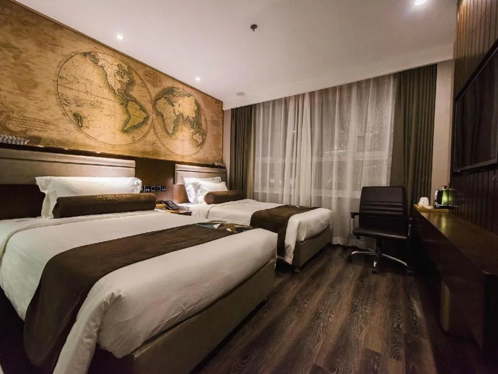 Bed in James Joyce Coffetel Jilin Railway Station Fortune Plaza