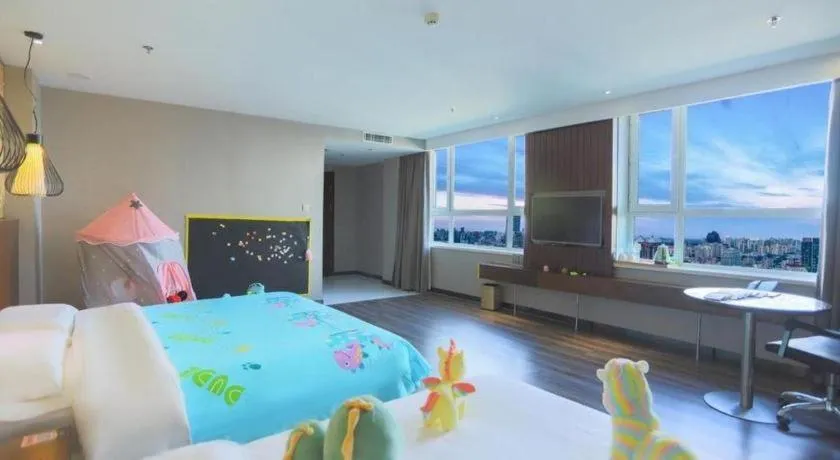 Bed in James Joyce Coffetel Jilin Railway Station Fortune Plaza