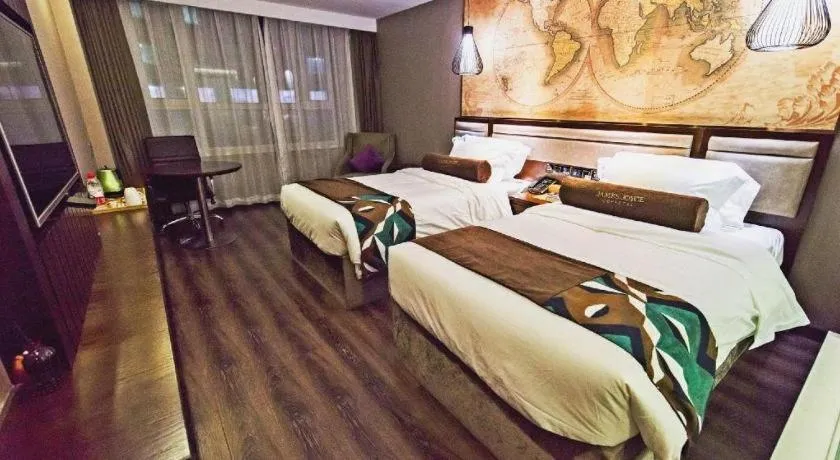 Bed in James Joyce Coffetel Jilin Railway Station Fortune Plaza
